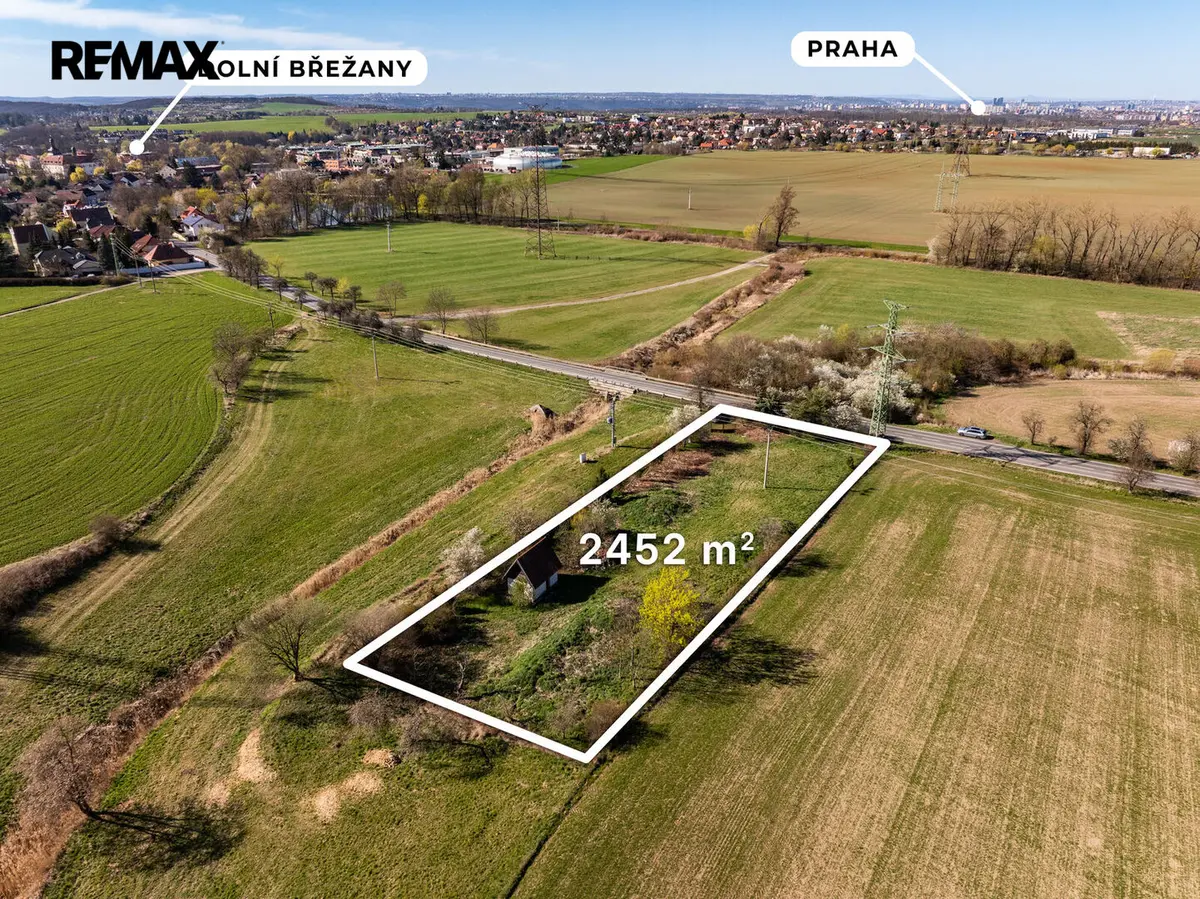 Prodej pozemku 2452 m², Dolní Břežany · okres Praha-západ