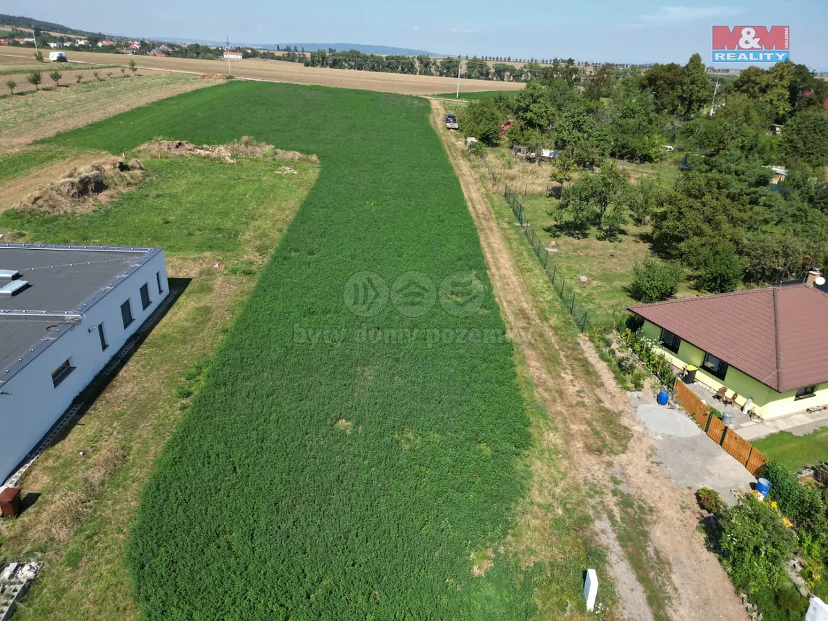Prodej pozemku 700 m², Určice · okres Prostějov