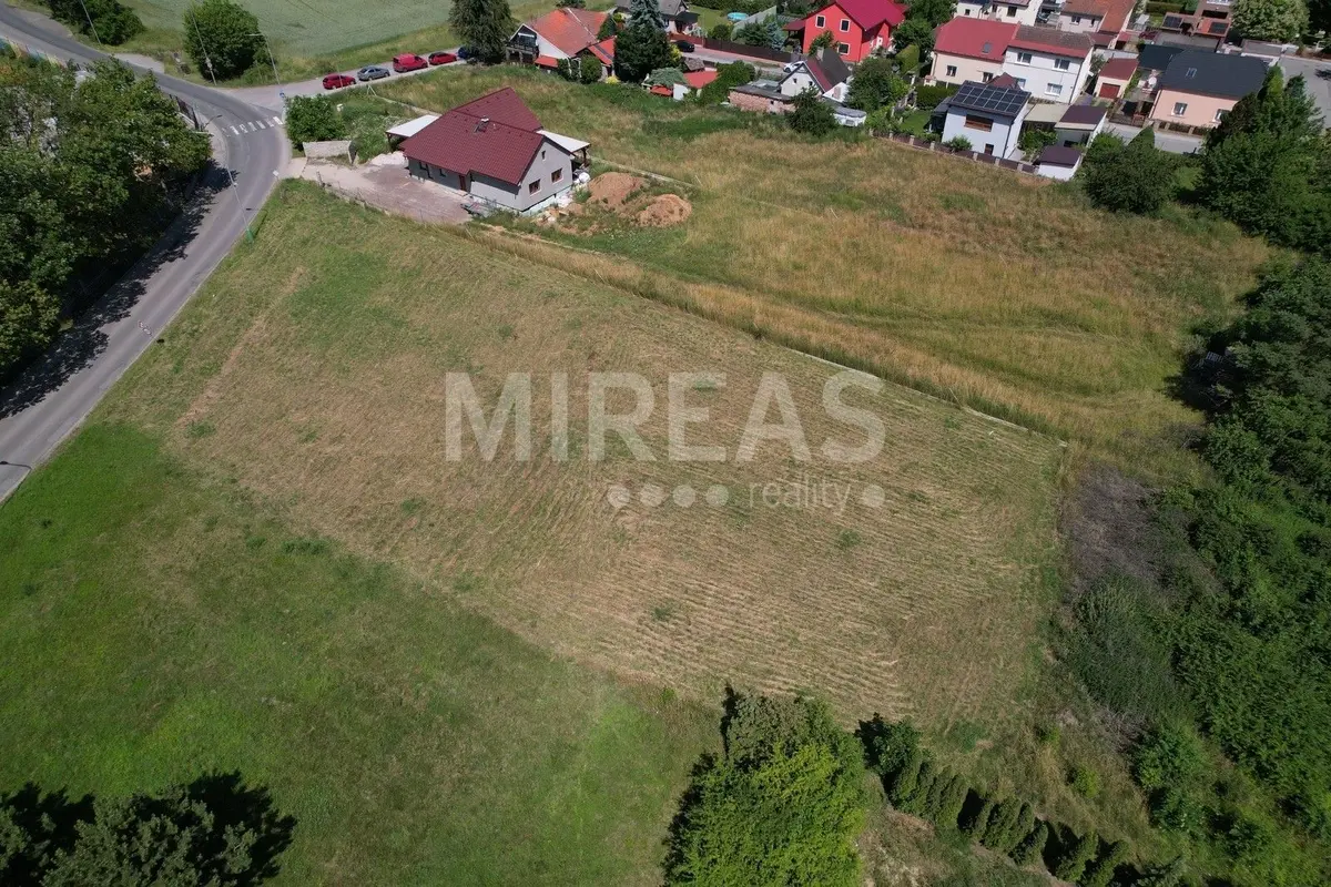 Prodej pozemku 1097 m², Debřská · Kosmonosy